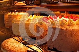 Huge cakes with icing in German bakery