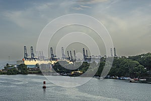 Huge car transport ship docked as Calle Contenedores, Panama Canal photo