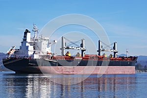 A huge cargo ship moored in the Columbia River