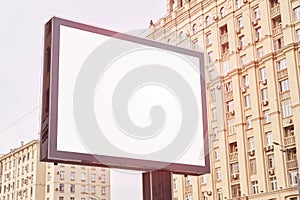 Huge city format billboard, advertising in Moscow on street, mockup of a blank white poster. Space for text.