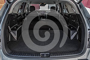 Huge, clean and empty car trunk in interior of compact suv.