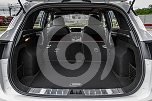 Huge, clean and empty car trunk in interior of compact suv.