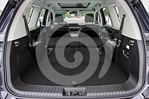 Huge, clean and empty car trunk in interior of compact suv.