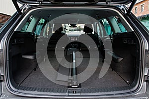 Huge, clean and empty car trunk in interior of a modern compact suv.