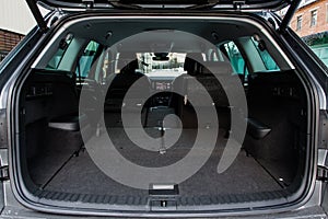 Huge, clean and empty car trunk in interior of a modern compact suv.