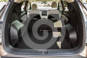 Huge, clean and empty car trunk of a modern compact suv.