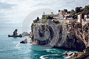 Huge cliff in the mediterranean sea near Taormina city in Sicily, Italy