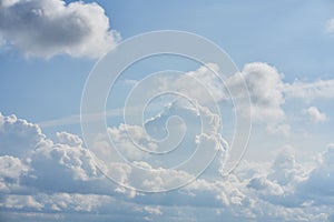 Huge clouds in the blue sky as background. Amazing skies and clouds