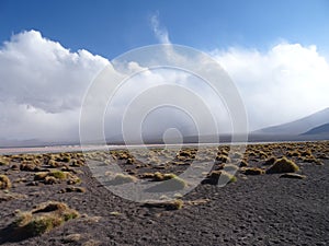 Huge clouds covering the high mountains in the Los Flamencos National Reserve, Chile