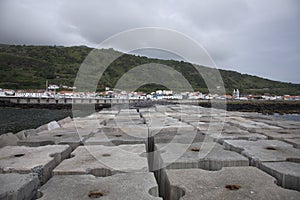 Huge concrete blocks in port of Lajes do Pico, Azores photo