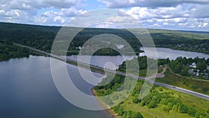 The huge Crimean bridge. Clip. A bridge passing through a long river against the background of forests and blue sky.