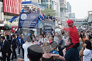 Huge crowds of Leicester City Supporters and redshirt boy celebrate with Leicester City Team parade