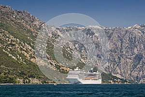Huge cruise liner ship in port of Kotor city, Montenegro
