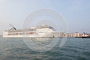 Huge cruise travel ship in Venice canal Italy