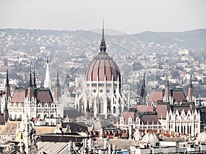 Huge dome of Hungarian Parliament Building - Orszaghaz. Unusual view from St. Stephen`s Basilica. Budapes, Hungary photo