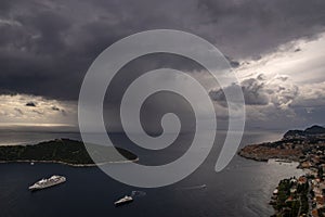 A huge downpour by the sea approaching Dubrovnik