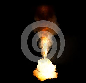 Huge, extremely hot explosion with sparks and hot smoke, against black background photo