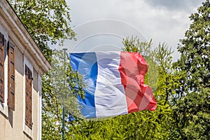 A huge flag of France made of silk  waving