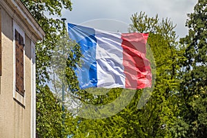 A huge flag of France made of silk  waving