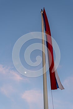 Huge flag of Serbia in front of the National Assembly of Serbia in Belgrade