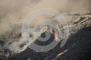 Huge flames on Carpinteria California hillside photo