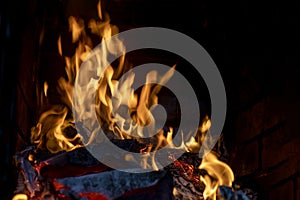 huge flames of fire on a dark background. Horizontal