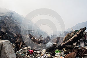 Huge garbage dump mountains view full of litter, plastic bottles,rubbish and other trash at the Thilafushi tropical island