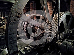 Huge gears mechanism of the old machinery photo