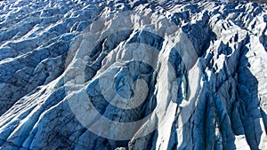 Huge glacier with pure blue ice at sunny weather. Vatnajokull glacier in Iceland. Beautiful nature abstract background