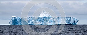 Huge glacier or table ice, iceberg at sea