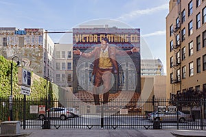 Huge Graffiti above a car parking structure