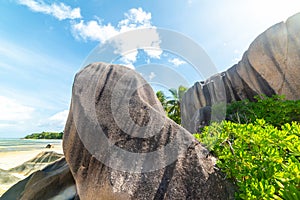 Huge granite boulders under a blue sky in Anse Source d\'Argent