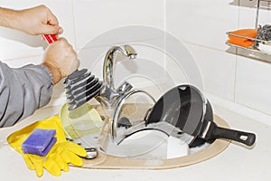 Huge heap of dirty dishes waiting for the flatmate