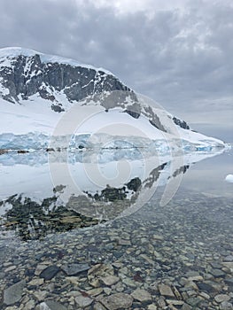 A huge high breakaway glacier in the southern ocean off the coast of Antarctica, the Antarctic Peninsula, the Southern