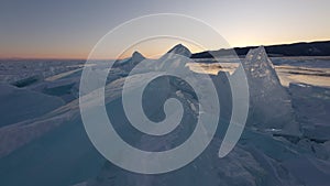 Huge ice hummocks on frozen surface of Baikal lake