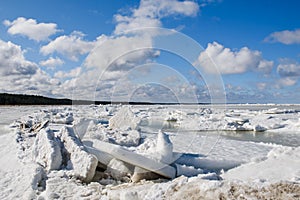 Huge ice stack at seaside. Baltic Sea.