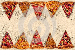 Huge international pizza on flour background