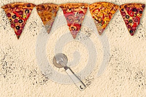 Huge international pizza on flour background