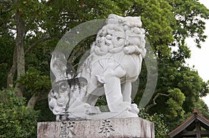 Huge Komainu dog-lion like guardian stone statue Izanagi Shrine photo