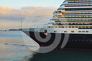 Huge luxury cruise ship arriving in port of Koper, Slovenia. Close-up view. Travel and tourism concept