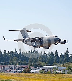 Huge military transport airplane landing with emergency supplies