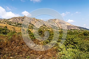 Huge monolith rock next to Mbabane, Eswatini photo