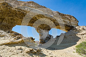 Huge natural rock arch at Lake Arco, Angola