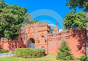 Huge old brick gates of the Pokrovskoe-Streshnevo Estate on a Sunny summer day. Moscow. Russia