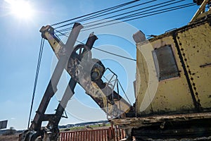 Huge old rusty abandoned mining excavator