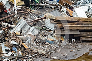 Huge pile of scrap metal waste on recycling yard