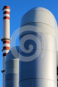 Huge pipe in steel factory under blue sky