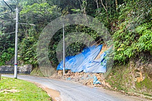 Huge plastic sheets used to temporarily halt slope soil erosion