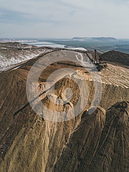 Huge potassium salt and sand piles, aerial landscape.