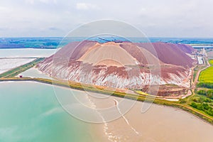 Huge potassium salt and sand piles, aerial landscape. Mining concept